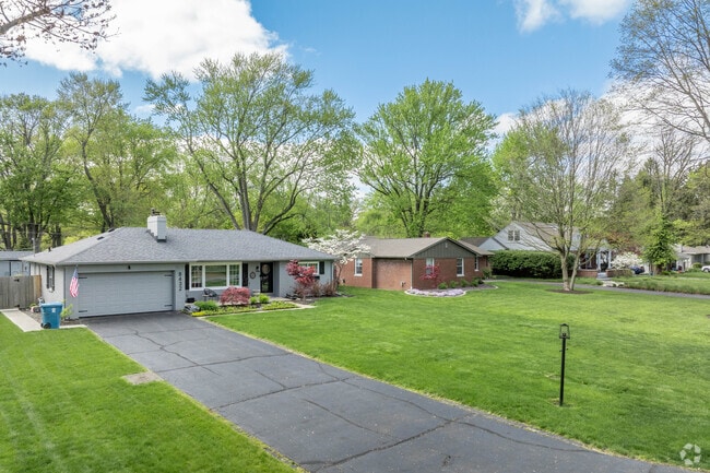 Rows of homes line the tree-lined streets of North Central, Indianapolis.