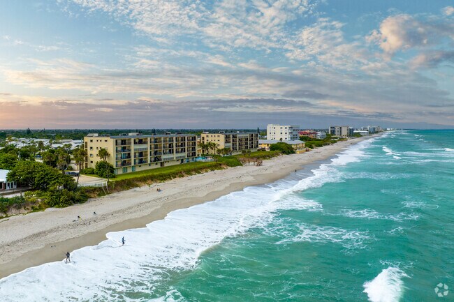 Tropical condominiums feature stunning balcony views of the water in Satellite Beach.