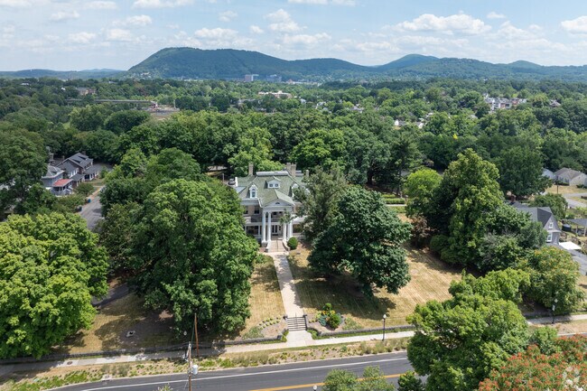 The Fishburn Mansion sits on a large piece of land overlooking the Mountains in Mountain View.