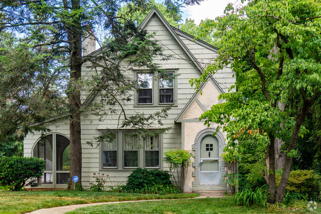 Architectural gems peak out behind the many trees of Chinquapin Park in Baltimore, MD.