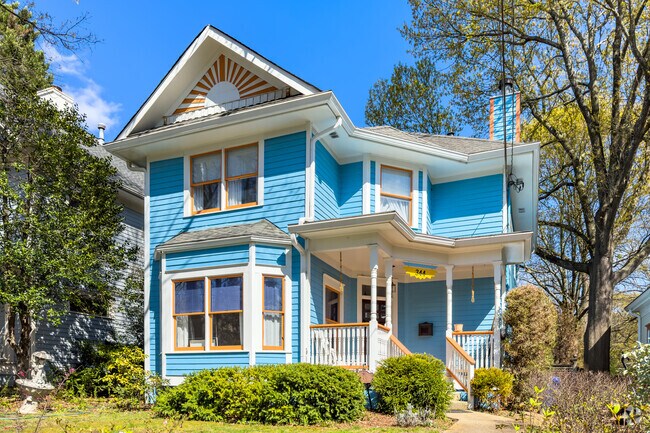 A bright blue Victorian breathes life into the Oakland neighborhood of Atlanta.