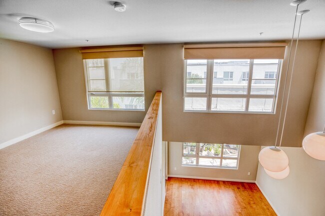 Loft-style living available in the townhomes with large windows for beautiful light