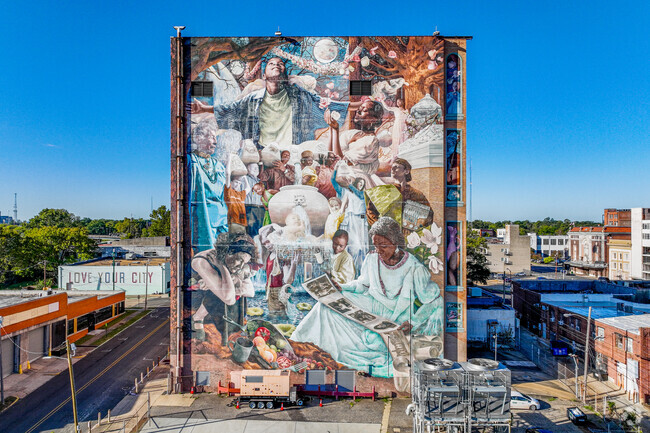 This masterpiece mural is on the side of a building in Downtown Riverfront.