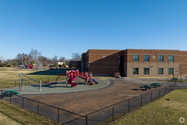 Children fill the playgrounds with laughter and joy at Rushmore Elementary School.