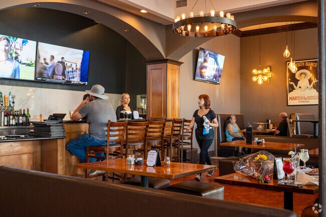 Catch the game and grab a slice at Pinocchio's Pizza in Normandie Heights.