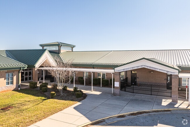 The entrance of Tyro Elementary School exudes a warm and inviting atmosphere.