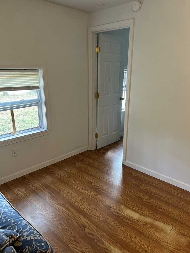 Livingroom looking at door to bedroom