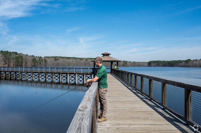 Butner residents enjoy fishing from the pier at Lake Rogers Park.