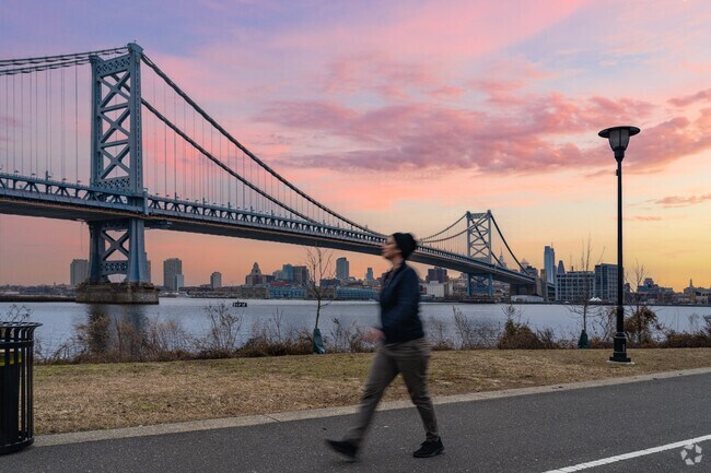 Walk through Cooper's Poynt Park for views of the Benjamin Franklin Bridge.
