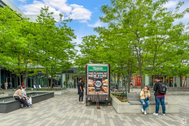 Empire Outlets has eateries like Nathan's Famous and Nori Sushi and offers views of the harbor.
