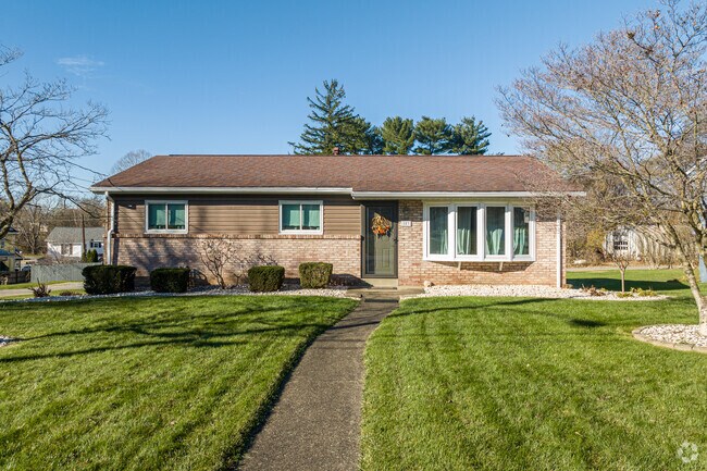 Small, ranch homes with large front yards are not uncommon in New Stanton.