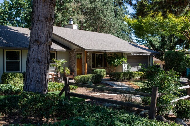 Sun breaks through to this Northwest contemporary home in the Ellsworth Springs neighborhood.