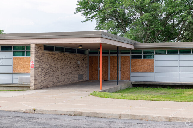 Closed since 2021, the George R. Staley Upper Elementary School has been securely boarded-up.