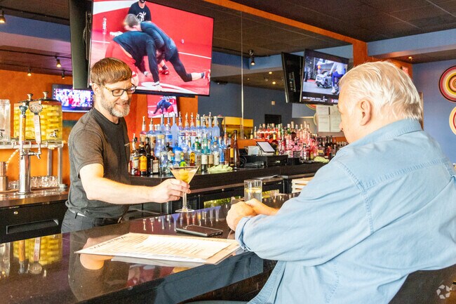 Mantra Bar & Grille blends traditional flavors with modern flair near Benson Gardens.