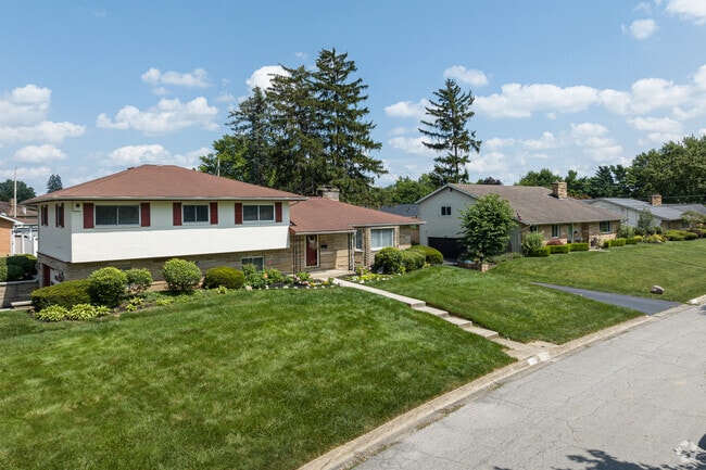 Hip-roofed split-level homes on larger lots can be found in Berwick, Columbus.