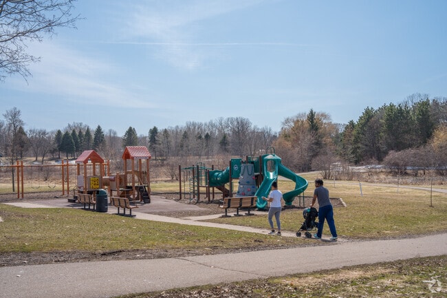 A Family on Their Way to a Playground in Battle Creek Upper Afton