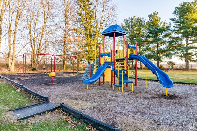 Village of Ashley Park has playground equipment for the kids.