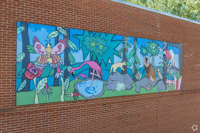 Bolton Park Elementary School showcases a nature-themed mural.