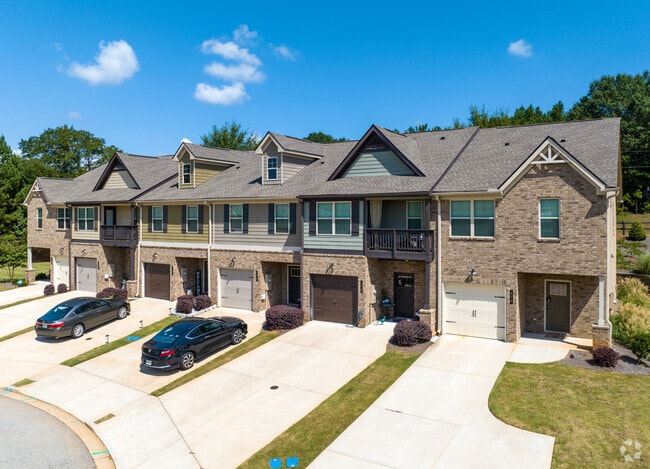 McDonough's housing also includes townhomes with brick siding and long driveways.