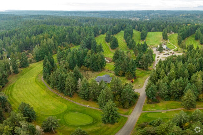 An overhead shot shows the Horseshoe Lake Golf Course in rural Wauna.