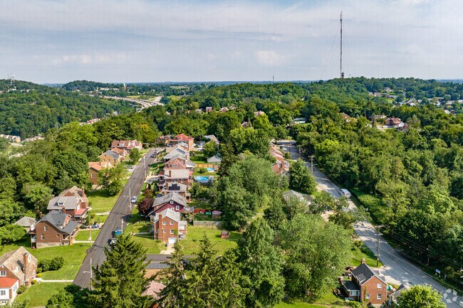 The rolling hills of Summer Hill create a peaceful green filled atmosphere.