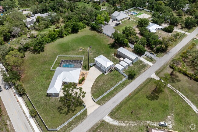 Many homes in DeSoto Acres have extra out building for storing all sorts of personal items.