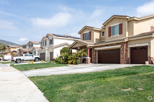 A row of multi-story single-family homes in Coyote Canyon.
