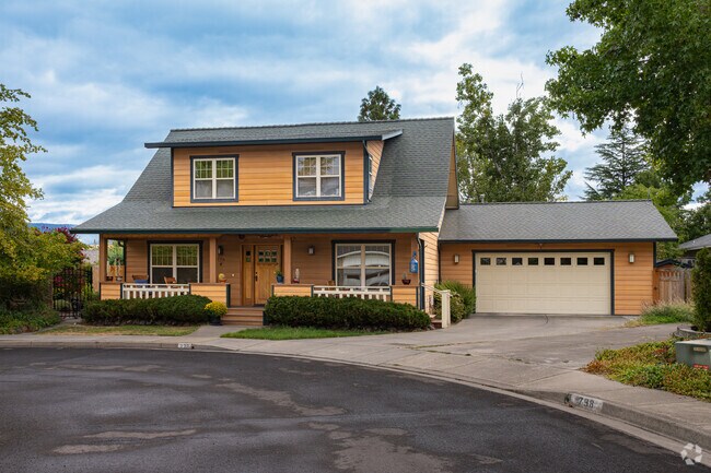 A Craftsman style home in South Ashland features a raw wood exterior.
