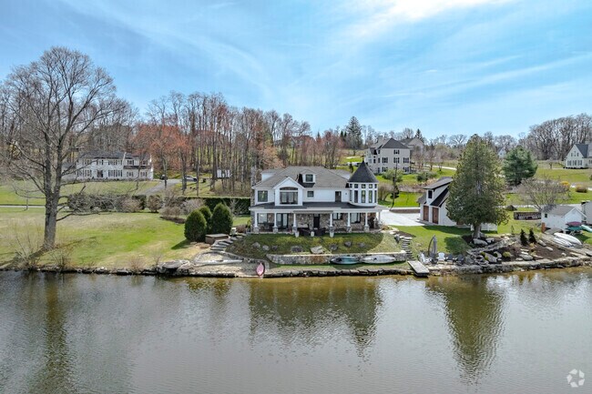 Beautiful homes dot the shoreline of Ball Pond in New Fairfield.