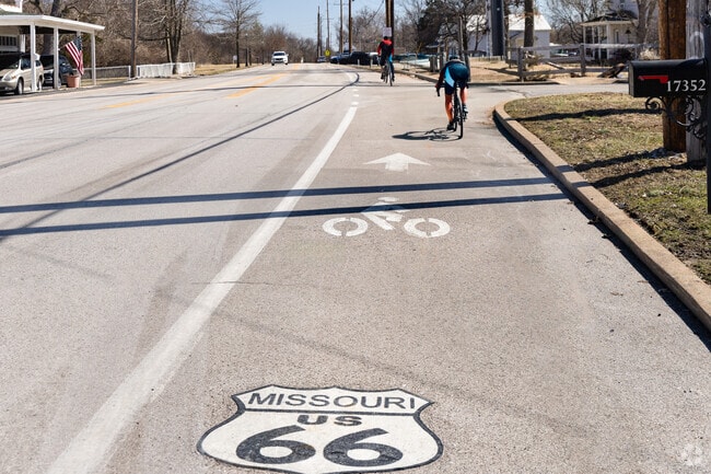 Ride along the historic Route 66 on dedicated bike lanes through scenic Wildwood, Missouri.