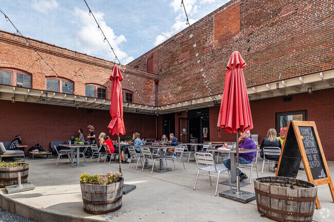 Trapezium Brewing is a favorite watering hole with fresh brick oven made pizza.