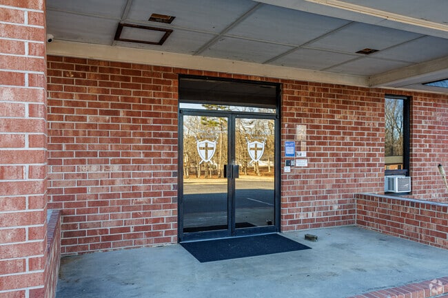 The entrance of Carolina Christian Academy welcomes visitors with a warm and inviting ambiance.