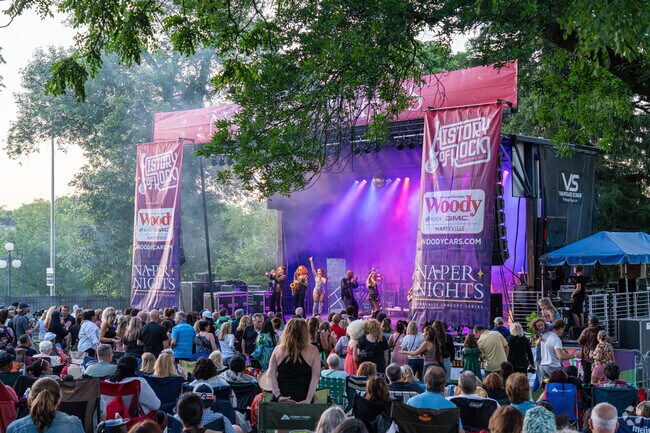 The Boogie Wonder Band pumps up the crowd with 70s hits at Naper Nights Community Concert near South Pointe.