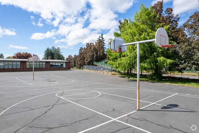 Basketball court in the outside field area for some pickup games.
