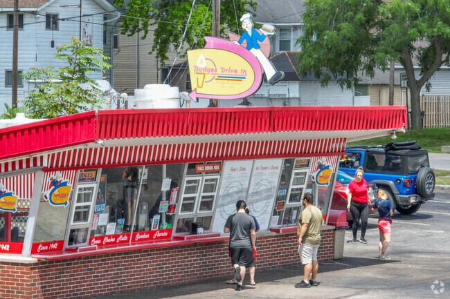 Budges Drive In draws people from across downtown for window-service ice cream and quick bites.