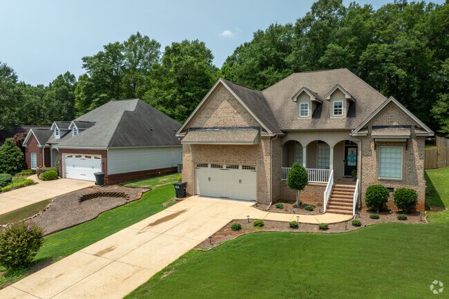 Many full brick homes grace the streets of Stephens Woods adding charm beauty to the neighborhood.