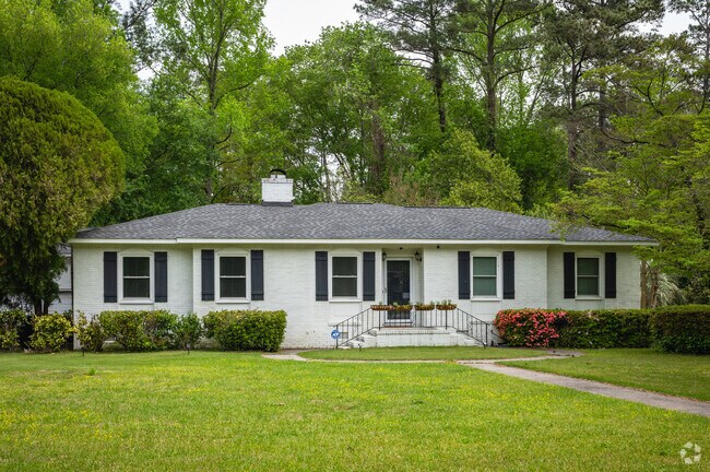 Painted brick provides an added dimension to a timeless classic home.