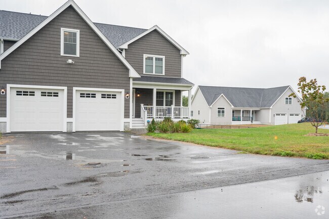 Craftsman homes in North Apponagansett often feature covered front porches.