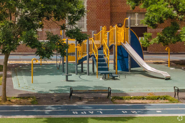 PS132 students use the playground during recess.