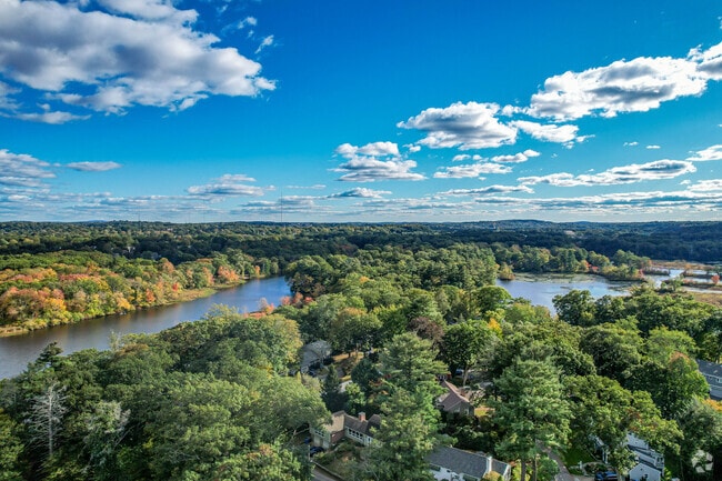 The village of Angleside is surrounded by greenery and water.