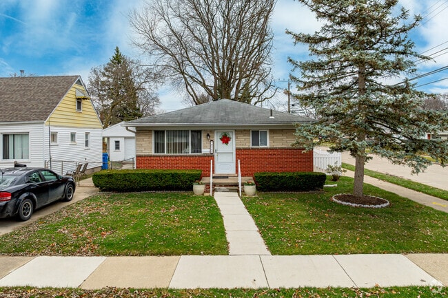 Cozy brick ranch homes in Dearborn Heights sit on modestly-sized lots with detached garages.