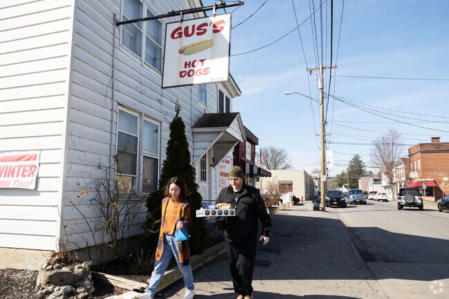 Gus's specializes in mini hot dogs with lots of toppings in Watervliet.
