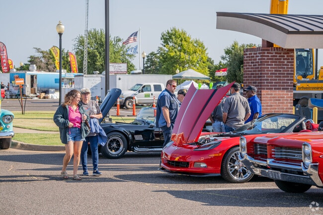 Locals enjoy the showcase of antique cars featured at the Car Show-Western Days Stampede.