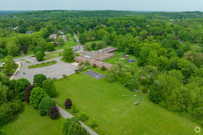 Immaculate Conception School offers a large and wide-open green area for students to play.