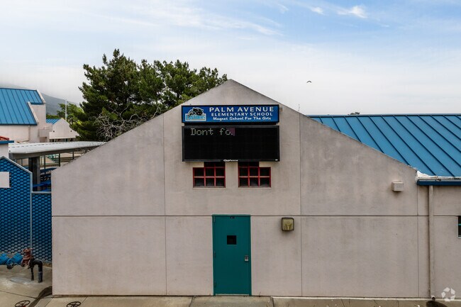 You'll find an informative signage display providing essential information about Palm Elementary