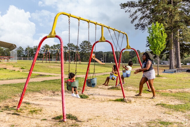 Magnolia families enjoy playing together at East Side Park.