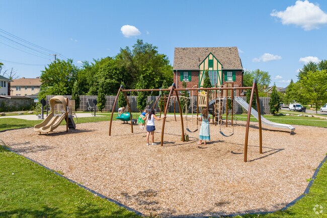 Children enjoy the modern playground at Gordon Park in Boston Edison.