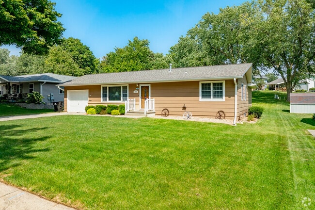 Midcentury ranch-style homes line the residential streets in Harlan.