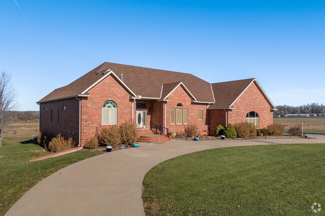 This El Dorado Home sits on a large lot of land.