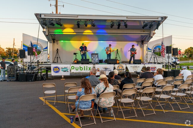 Davenport residents enjoy food and live music at the Community BBQ Event.